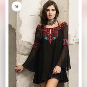 NWT Ladies Lg black sheer blouse with beautiful embroidery design. New with tag.